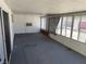 Enclosed sunroom features windows and sliding doors, providing ample light and indoor-outdoor living at 1674 Seneca Ln, Las Vegas, NV 89169