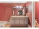 Bathroom boasts double sinks, granite countertops, and a neutral color scheme, creating a peaceful ambiance at 1812 N Decatur Blvd # 103, Las Vegas, NV 89108