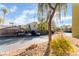 Community featuring mature trees, covered parking, desert landscaping and multi-story condo buildings at 1812 N Decatur Blvd # 103, Las Vegas, NV 89108