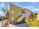 Inviting exterior showcasing an upper level entrance, with colorful plants enhancing its curb appeal at 1812 N Decatur Blvd # 103, Las Vegas, NV 89108