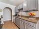 Functional kitchen features stainless steel appliances and granite countertops at 1812 N Decatur Blvd # 103, Las Vegas, NV 89108