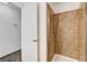 Bathroom showing tiled shower behind a white door at 1846 N Decatur Blvd # 104, Las Vegas, NV 89108
