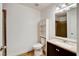 A clean bathroom featuring a toilet with built-in storage at 1846 N Decatur Blvd # 104, Las Vegas, NV 89108