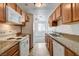 Efficient kitchen with modern appliances and ample counter space at 1846 N Decatur Blvd # 104, Las Vegas, NV 89108