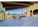 Relaxing balcony with seating offers stunning views of the city skyline and nearby tennis courts, perfect for enjoying the outdoors at 2101 Plaza Del Fuentes, Las Vegas, NV 89102
