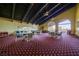 Spacious clubhouse featuring vaulted wood ceilings, expansive windows, and comfortable seating arrangement for gatherings at 2101 Plaza Del Fuentes, Las Vegas, NV 89102