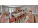 Elegant dining room boasts wood floors and seamlessly connects to living spaces for gatherings at 2101 Plaza Del Fuentes, Las Vegas, NV 89102