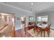 Open dining room with hardwood floors and adjacent view of other living spaces at 2101 Plaza Del Fuentes, Las Vegas, NV 89102