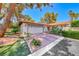 Charming single story home featuring a brick driveway, two car garage and desert landscaping at 2101 Plaza Del Fuentes, Las Vegas, NV 89102