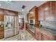 Modern kitchen features stainless steel appliances, granite countertops and custom cabinetry at 2101 Plaza Del Fuentes, Las Vegas, NV 89102