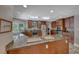 Large kitchen with granite counters, stainless appliances, and center island with seating at 2101 Plaza Del Fuentes, Las Vegas, NV 89102