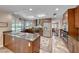 Spacious kitchen with stainless steel appliances, granite counters, and abundant cabinet space at 2101 Plaza Del Fuentes, Las Vegas, NV 89102