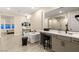 Bright bathroom with a soaking tub, walk in shower, dual sink vanity, and tile floors at 230 Cactus Sunrise St, Las Vegas, NV 89138