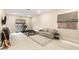 Large bonus room with sofa and workout equipment at 230 Cactus Sunrise St, Las Vegas, NV 89138