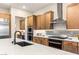 Beautiful kitchen with stainless steel appliances, a white countertop, and plenty of storage at 230 Cactus Sunrise St, Las Vegas, NV 89138