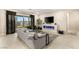Bright living room features a modern fireplace and sliding glass doors to the backyard at 230 Cactus Sunrise St, Las Vegas, NV 89138