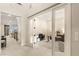 Bright home office space with glass doors and an open concept leading into other living spaces at 230 Cactus Sunrise St, Las Vegas, NV 89138