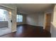 Living area with balcony access and an open doorway at 2300 E Silverado Ranch Blvd # 1104, Las Vegas, NV 89183