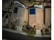 Aerial view of home with solar panels, landscaping, and private backyard at 2486 Divine Sky Dr, Henderson, NV 89044