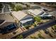 Aerial view showcasing a private backyard with covered patio and desert landscaping at 2486 Divine Sky Dr, Henderson, NV 89044