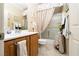 Bathroom with a vanity, toilet, and shower tub combo at 2486 Divine Sky Dr, Henderson, NV 89044