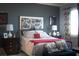 Tastefully decorated main bedroom with patterned headboard, creating a serene retreat at 2486 Divine Sky Dr, Henderson, NV 89044