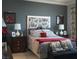 Tastefully decorated main bedroom with patterned headboard, creating a serene retreat at 2486 Divine Sky Dr, Henderson, NV 89044