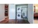 Laundry room with stacked washer and dryer, shelving, and storage space at 2700 Las Vegas Blvd # 1804, Las Vegas, NV 89109