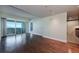 Spacious living room with hardwood floors and sliding glass doors leading to a balcony with city views at 2700 Las Vegas Blvd # 1804, Las Vegas, NV 89109