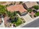 Aerial view of a single-Gathering home showcasing its well-kept lawn, mature landscaping, and inviting curb appeal at 2808 Crown Ridge Dr, Las Vegas, NV 89134