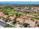 This aerial view of this golf course community highlights well-manicured homes and a perfectly maintained green at 2808 Crown Ridge Dr, Las Vegas, NV 89134