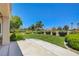 Serene backyard with lush landscaping and golf course views at 2808 Crown Ridge Dr, Las Vegas, NV 89134