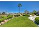 Expansive backyard with manicured landscaping and mature trees at 2808 Crown Ridge Dr, Las Vegas, NV 89134
