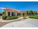 Exterior view of home showcases manicured landscaping and inviting curb appeal at 2808 Crown Ridge Dr, Las Vegas, NV 89134