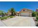 Attractive single-story home with a spacious driveway and a two-car garage at 2808 Crown Ridge Dr, Las Vegas, NV 89134