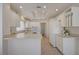 Bright kitchen with white cabinets, recessed lighting, and a functional layout at 2808 Crown Ridge Dr, Las Vegas, NV 89134