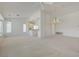 Spacious living room with an adjacent kitchen area and bright natural light at 2808 Crown Ridge Dr, Las Vegas, NV 89134