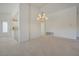 Open living room space with views of the kitchen and lots of natural light at 2808 Crown Ridge Dr, Las Vegas, NV 89134