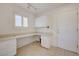 Bright office features a built-in desk, storage, and tile flooring at 2808 Crown Ridge Dr, Las Vegas, NV 89134