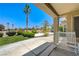 Enjoy the sun on this covered patio with a view of the community landscaping at 2808 Crown Ridge Dr, Las Vegas, NV 89134