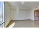 Empty bedroom with tile flooring, bright natural light, and ensuite bathroom at 322 Karen Ave # 1106, Las Vegas, NV 89109