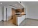 Charming kitchen featuring light wood cabinets, granite countertops and stainless steel appliances at 322 Karen Ave # 1106, Las Vegas, NV 89109