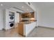 Bright kitchen area with wood cabinets, granite countertops, and stainless appliances at 322 Karen Ave # 1106, Las Vegas, NV 89109