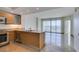 Modern living space with an open kitchen and plenty of natural light from the balcony at 322 Karen Ave # 1106, Las Vegas, NV 89109