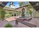 Picturesque courtyard with a fountain, benches, and lush greenery, offering a serene outdoor retreat at 3220 Calle De El Cortez, Las Vegas, NV 89102