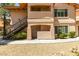 Charming two-story condo with a private balcony and landscaped grounds at 350 S Durango Dr # 103, Las Vegas, NV 89145