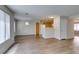 Bright living room showcasing wood-look floors and an open layout, perfect for entertaining at 350 S Durango Dr # 103, Las Vegas, NV 89145