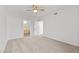 A carpeted bedroom with two doors leading to the bathroom and hallway at 3608 Quetonia St # 204, Las Vegas, NV 89108