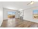 Bright living room featuring a cozy fireplace and a sliding glass door to the balcony at 3608 Quetonia St # 204, Las Vegas, NV 89108