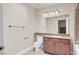 Clean bathroom with granite countertop and ample lighting at 4050 Pacific Harbors Dr # 224, Las Vegas, NV 89121
